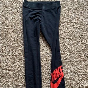 Black Nike leggings with Red Nike logo